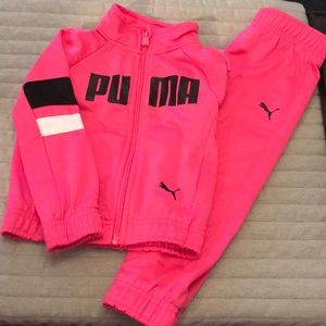 Puma track suit.